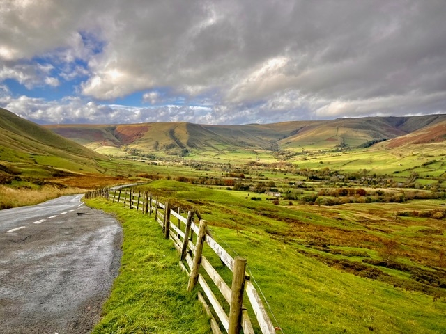 Scenic country road winding through the rolling hills of Edale.